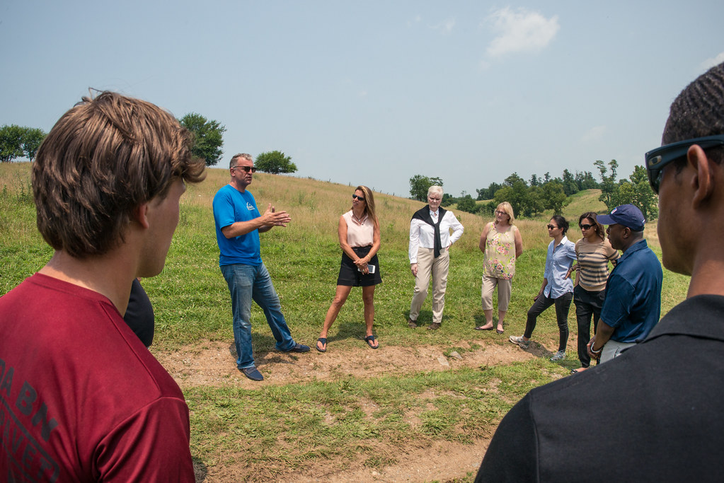 Farm and land stakeholders discussing priorities together in the field