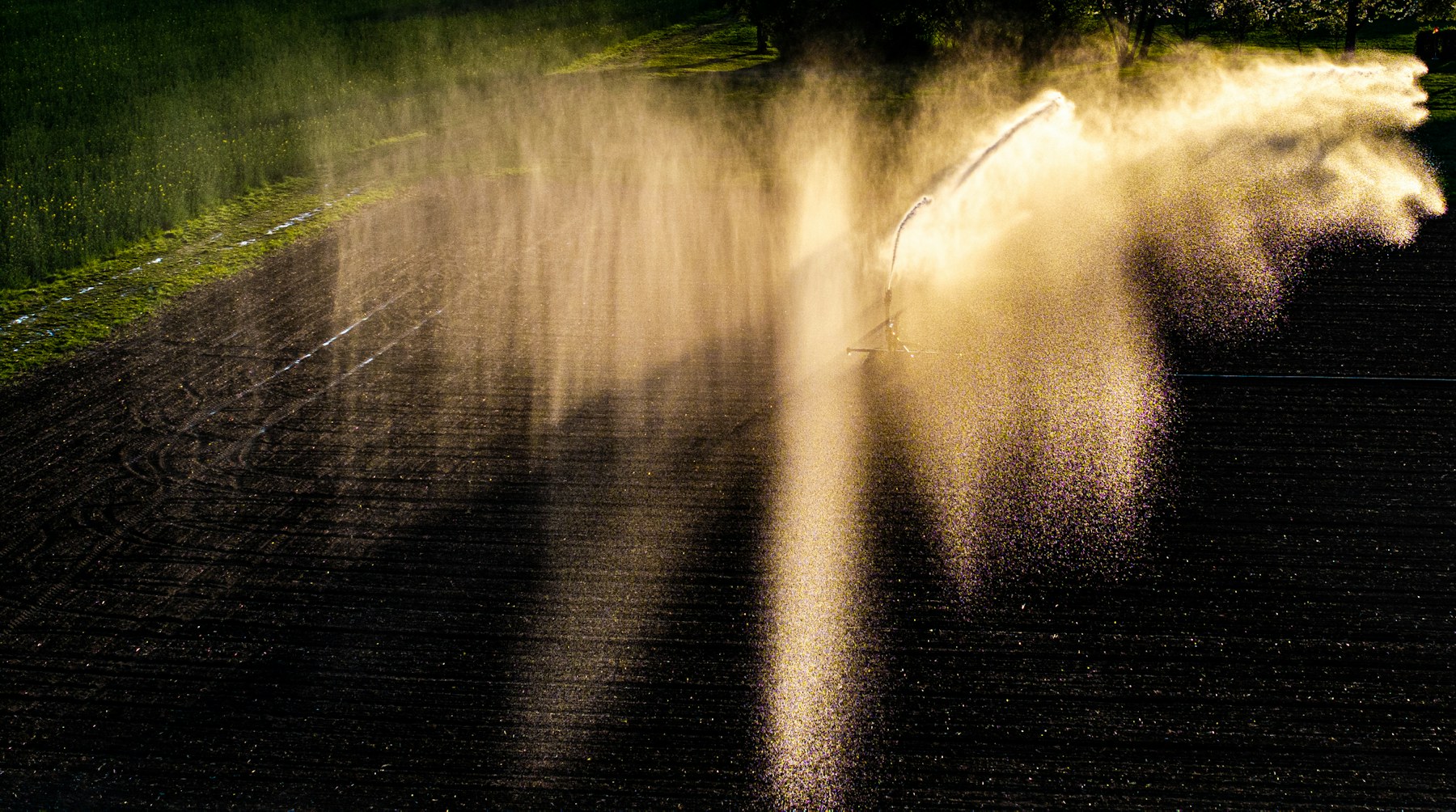 An irrigation system distributing water across cultivated land